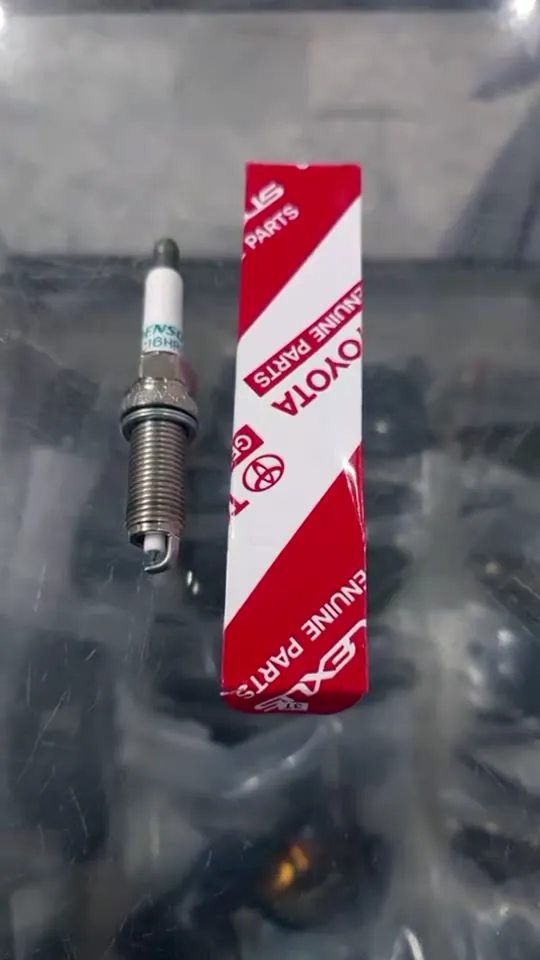 Old and new Toyota spark plugs side by side
